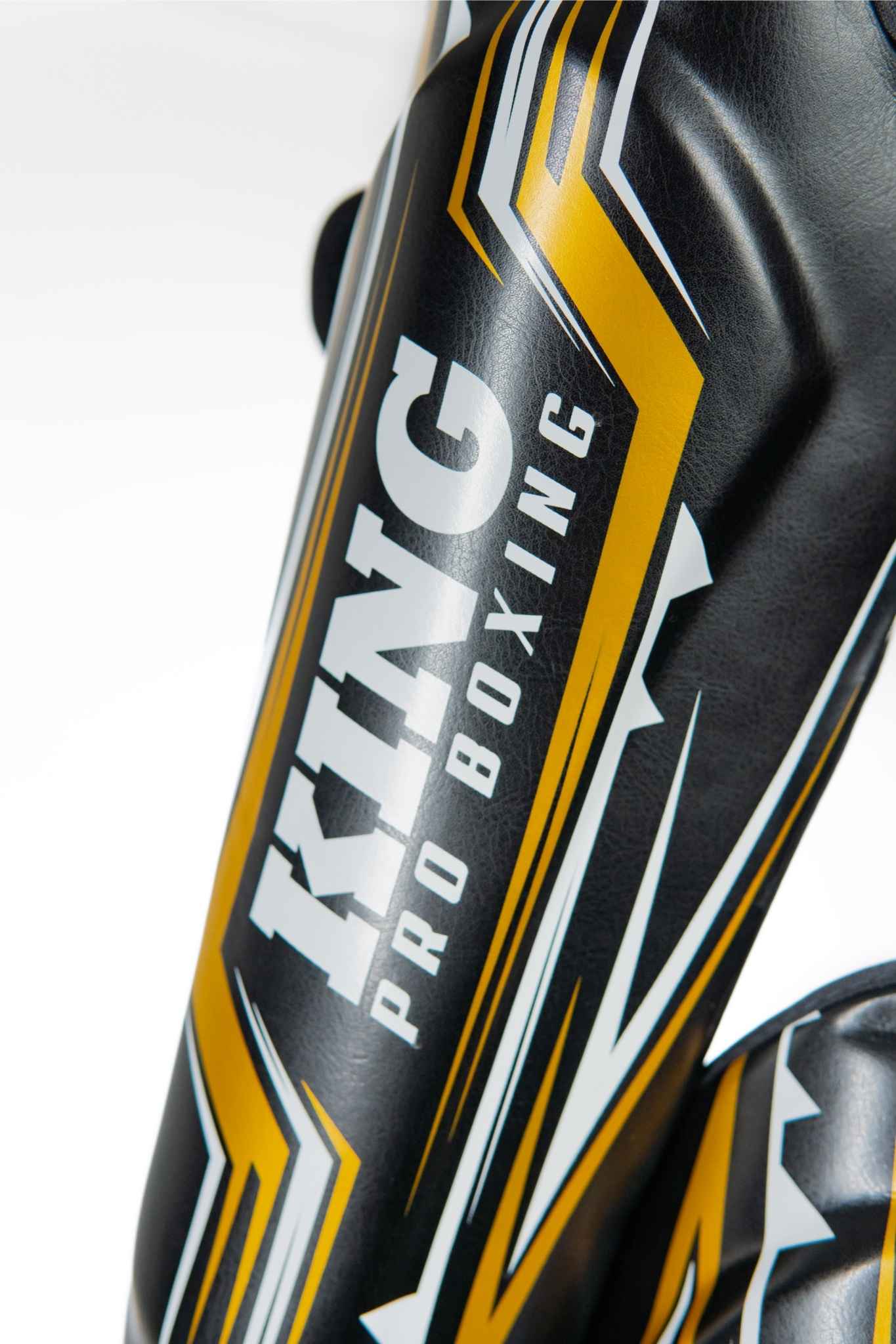KING PRO BOXING “SPARTAN” LEG SHIELD "BLACK/GOLD"
