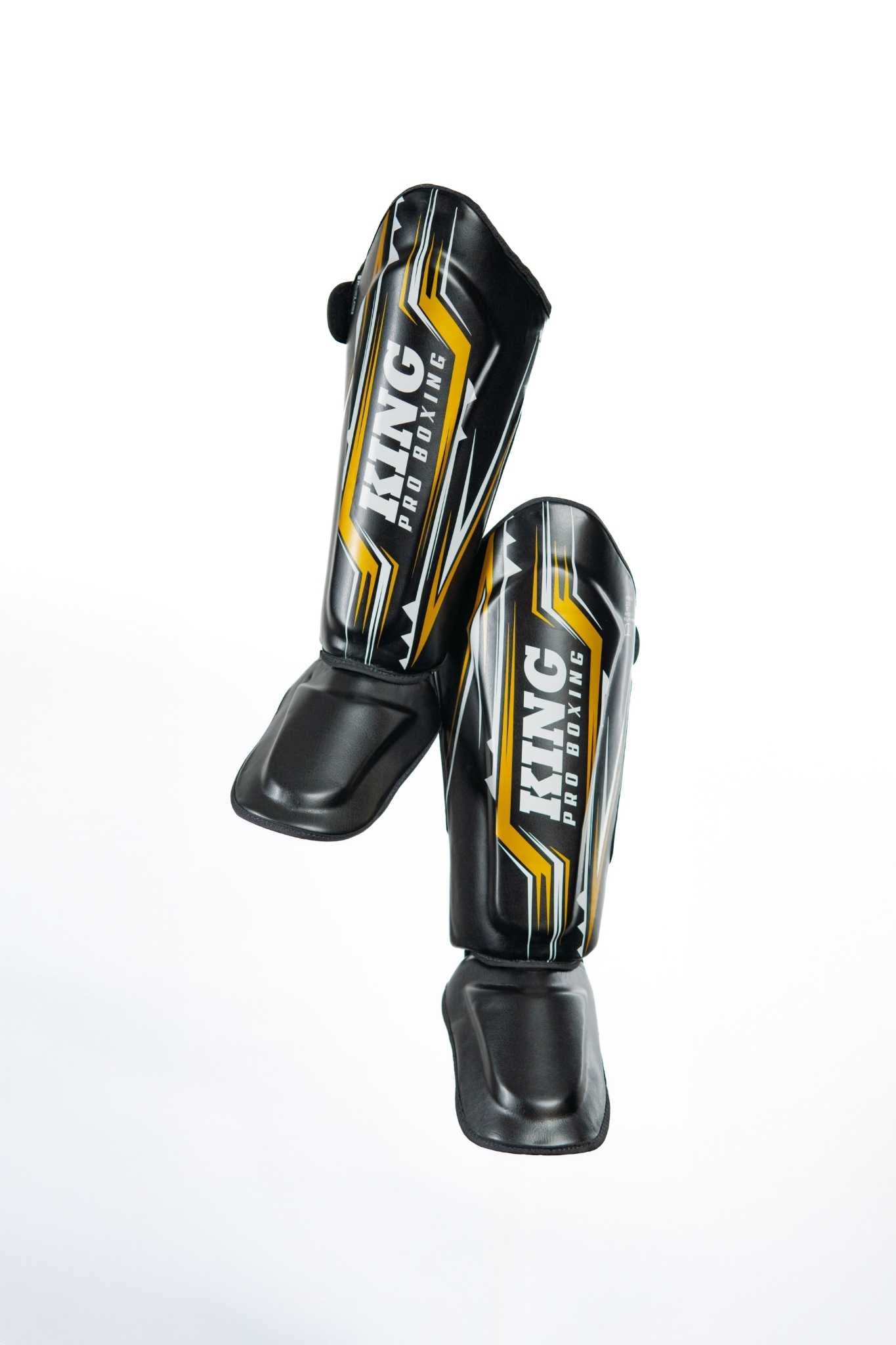 KING PRO BOXING “SPARTAN” LEG SHIELD "BLACK/GOLD"